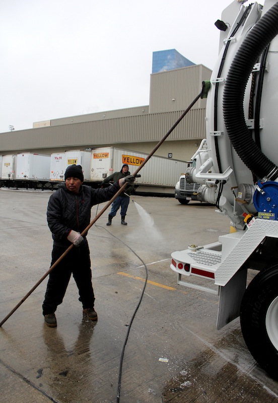 A crew from Fleetwash sprays down a vacuum truck Tuesday morning as move-in continued for the 2016 Water & Wastewater Equipment, Treatment & Transport Show in Indianapolis. The show opens Wednesday at 8 a.m. with Education Day.