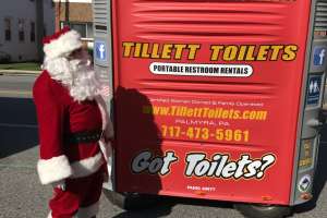 Santa rolling toilet