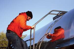 Setting Up Restrooms Along Rustic North Woods Paths