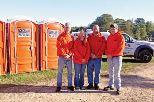 Setting Up Restrooms Along Rustic North Woods Paths
